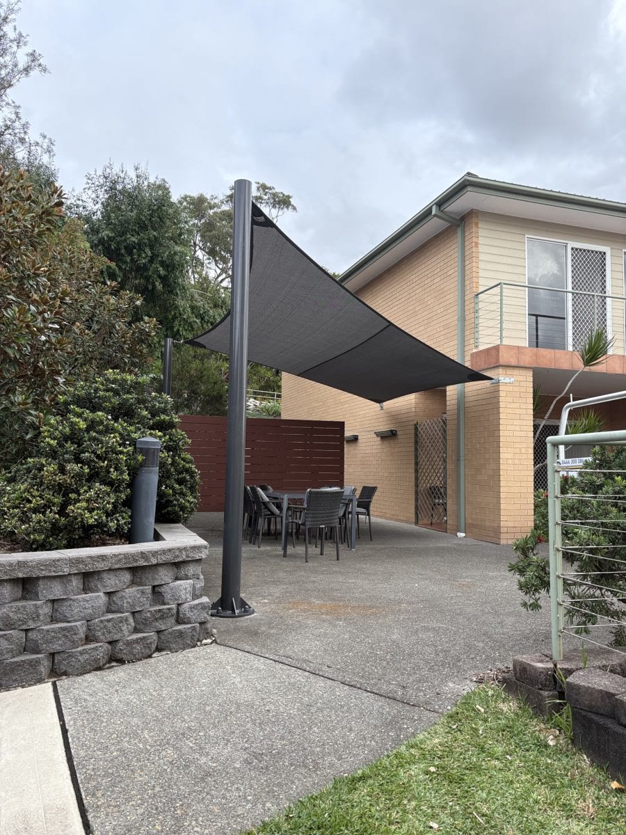 Shade sail over home patio
